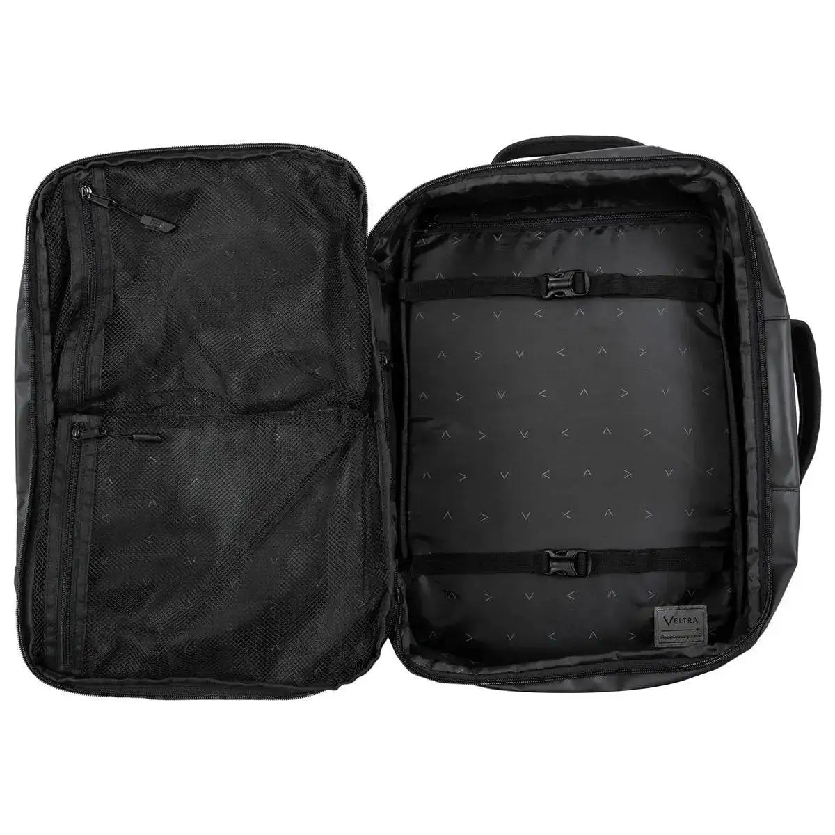 Fully opened Highlander Veltra 44L Cabin Bag Black revealing organized storage space with compression straps and zippered mesh pockets.  from  John Bull Clothing 