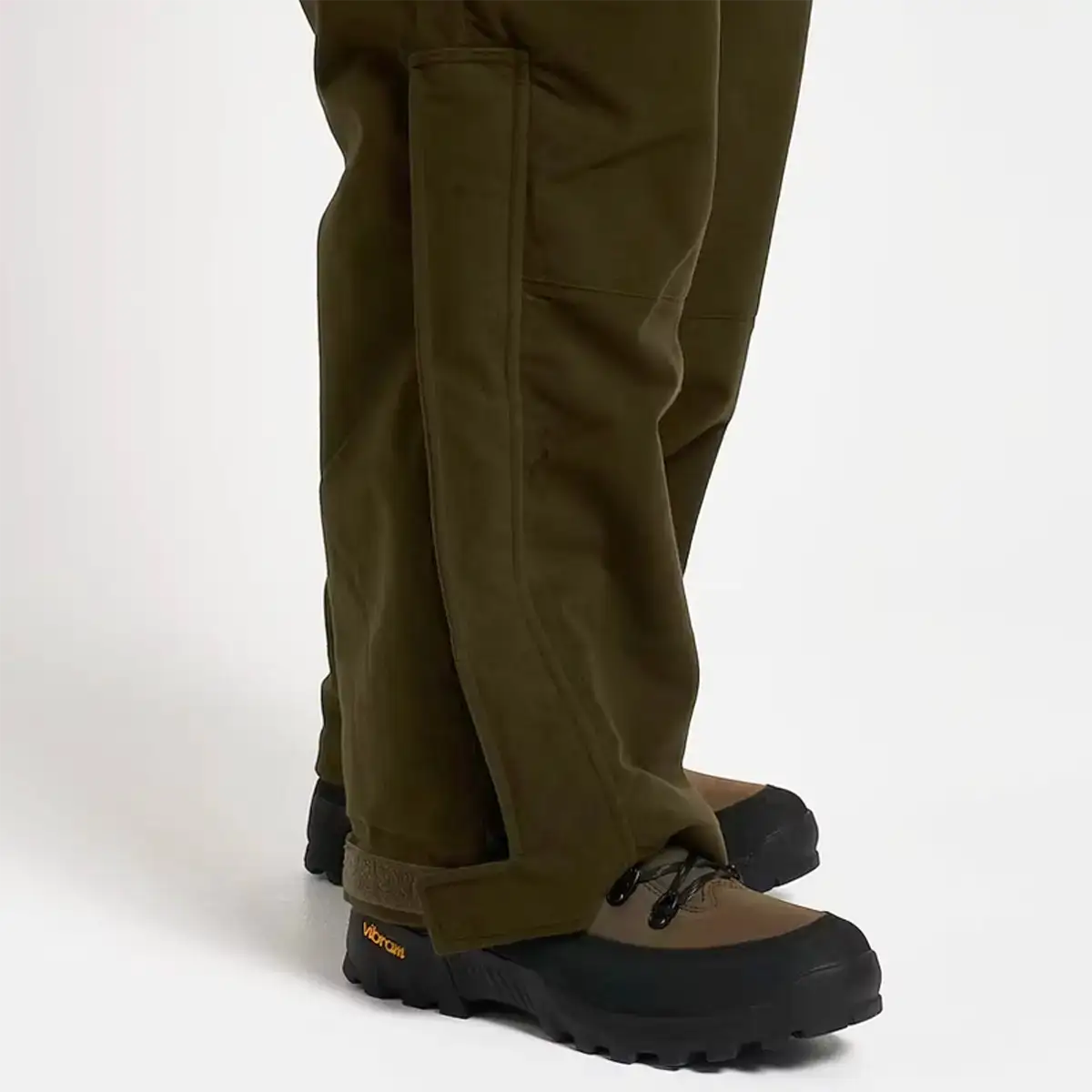 Close-up of lower leg and boot area of Jack Pyke Hunters Trousers Green Waterproof, showing reinforced seams and durable fabric.  from  John Bull Clothing 