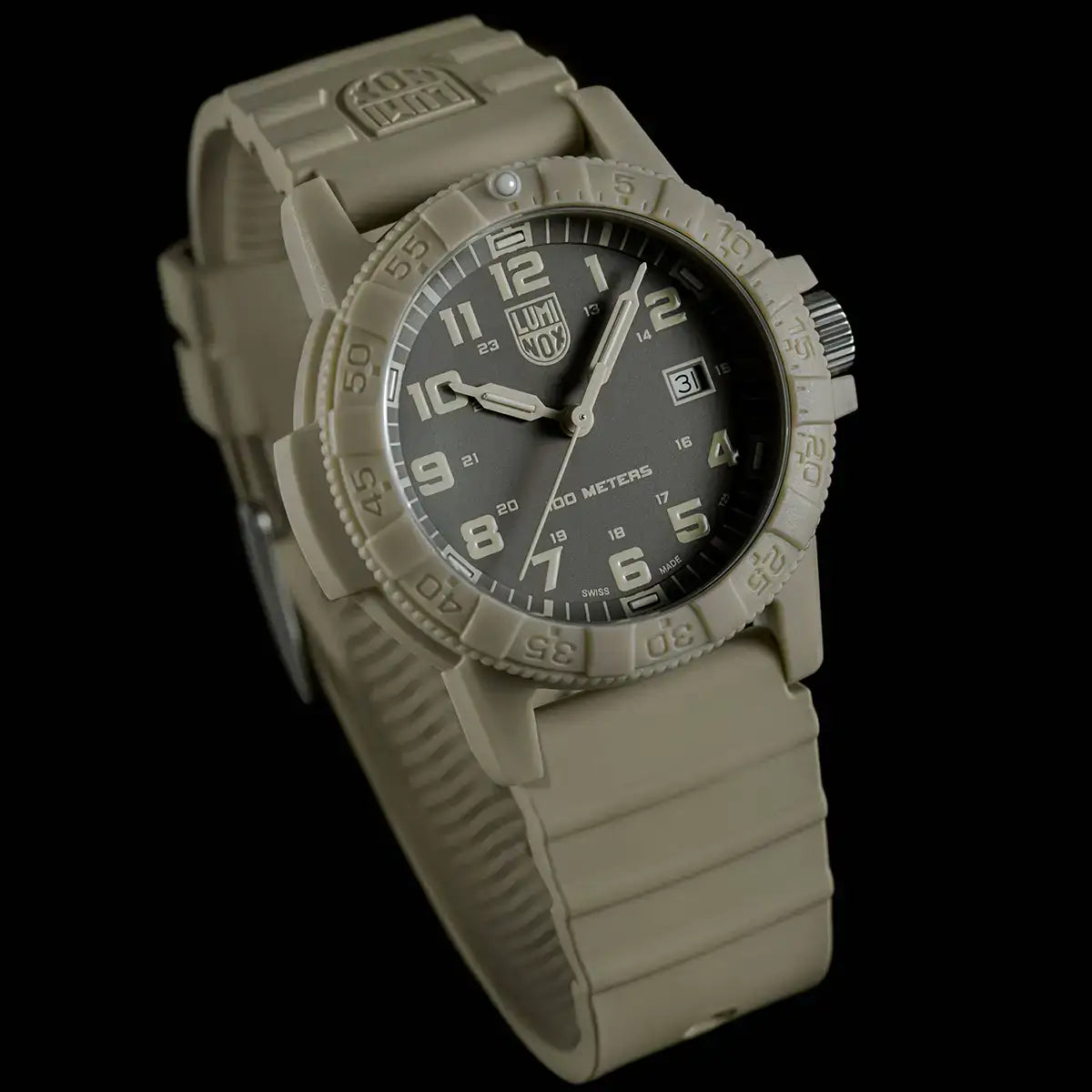 Close-up of beige silicone strap and textured bezel of Luminox Leatherback Sea Turtle Giant 44mm watch with grey dial