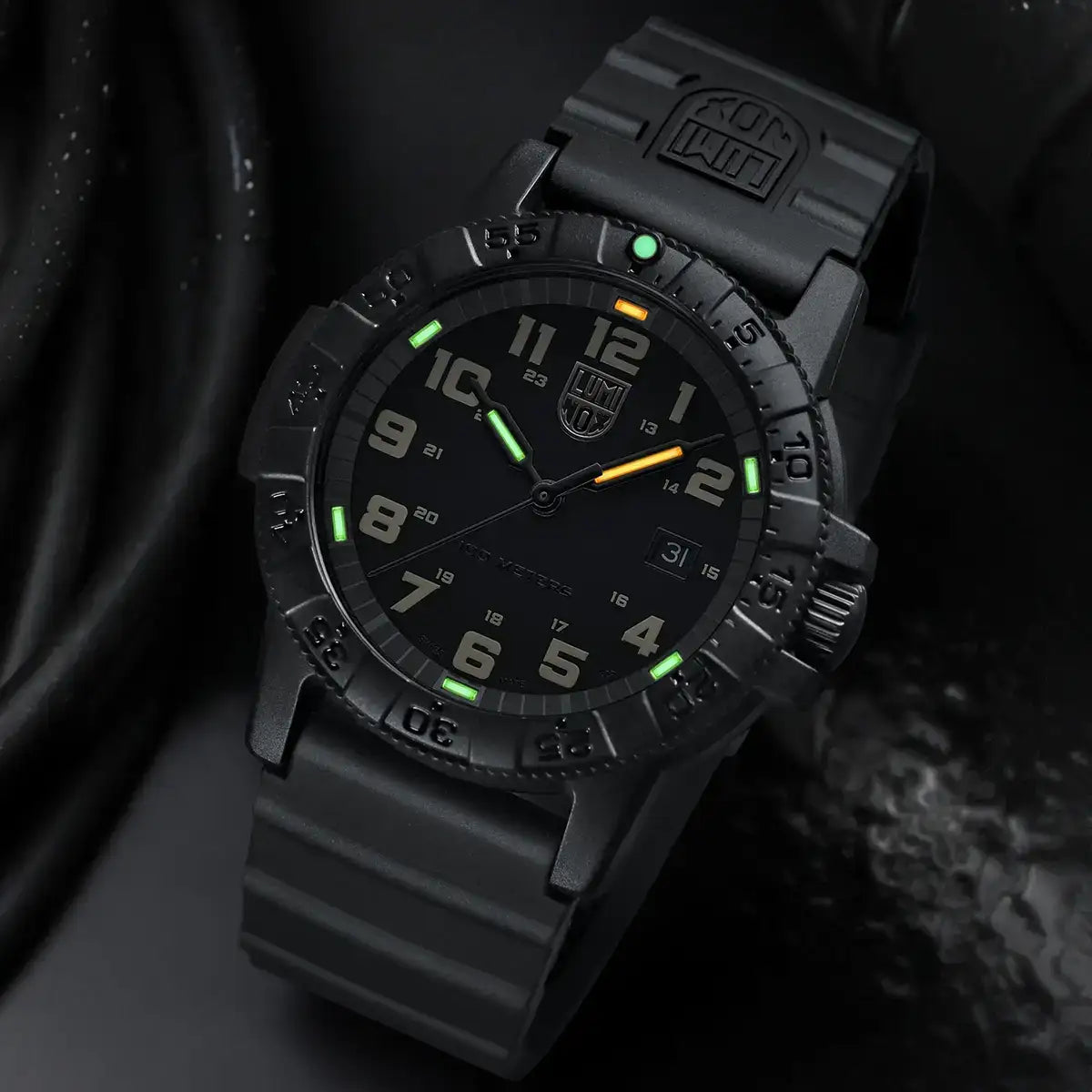 Close-up of black Luminox Leatherback Sea Turtle Giant 44mm watch face with luminous hands, markers, and date window