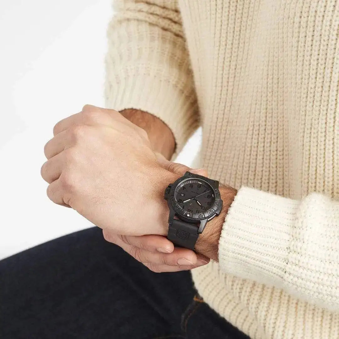 Man wearing the Luminox Leatherback Sea Turtle Giant Watch XS.0321.BO.L, demonstrating its bold black design and comfortable fit on the wrist.  from  John Bull Clothing 
