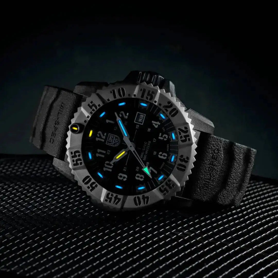 Luminox Mil-Spec 3350 Series Watch 46mm Black XL.3351.SET glowing in the dark with blue and yellow luminescent markers.  from  John Bull Clothing 