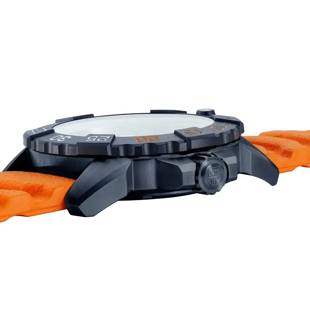 Back view of Luminox Navy Seal Foundation watch showing black case, orange strap, and engraved case back with logo and specifications