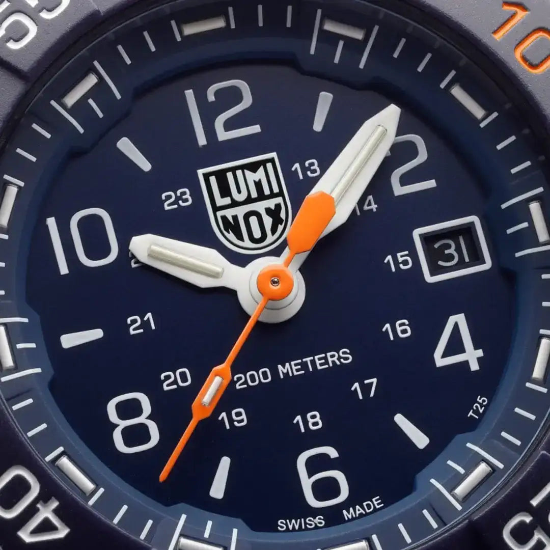 Luminox Navy Seal Foundation Back to Blue military watch with navy blue dial, white luminous hands, orange second hand, and date window, SKU: JB1659