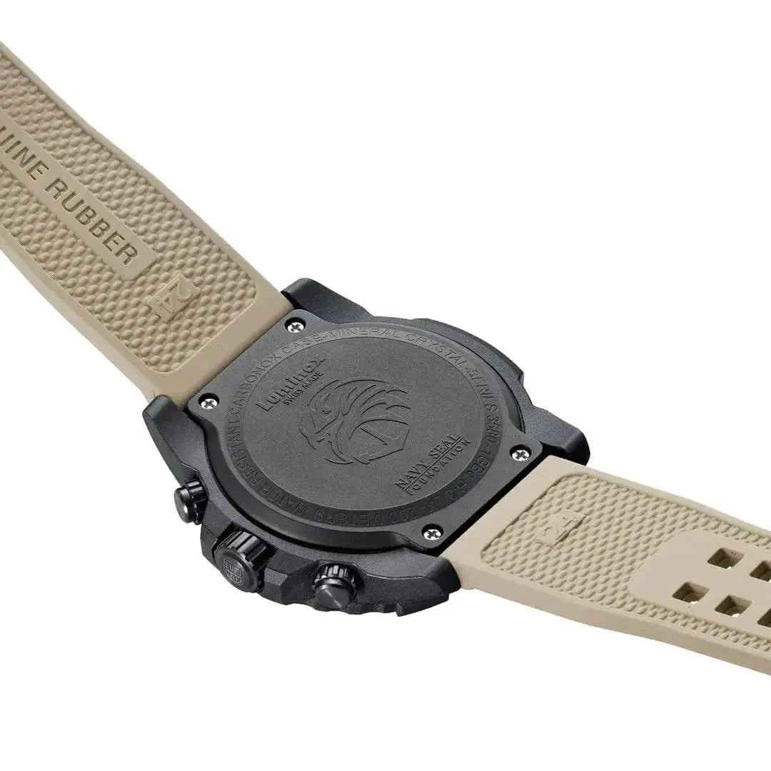 Back view of the Luminox Navy SEAL Foundation Chronograph Dive Watch with an engraved case back and beige rubber strap.  from  John Bull Clothing 
