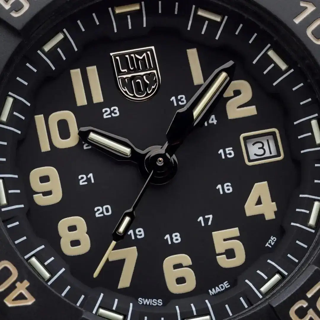 Close-up of Luminox Navy Seal Military Black Dive Watch 45mm XS.3510 dial showing beige numerals, Swiss Made label, and date window at 3 o'clock.  from  John Bull Clothing 