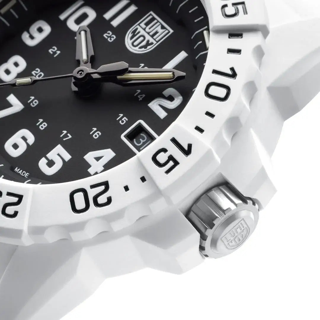 Detailed view of Luminox Navy Seal White Military Dive Watch 45mm XS.3507.WB bezel and crown, emphasizing rugged Carbonox construction.