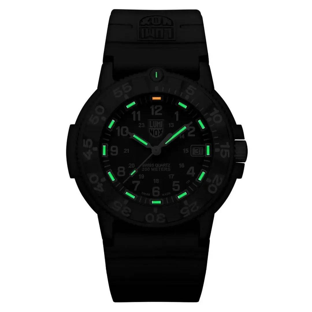 Luminox Navy Seal 3000 Series Diver Watch XS.3001.F showcasing its self-powered illumination system glowing in low-light conditions.