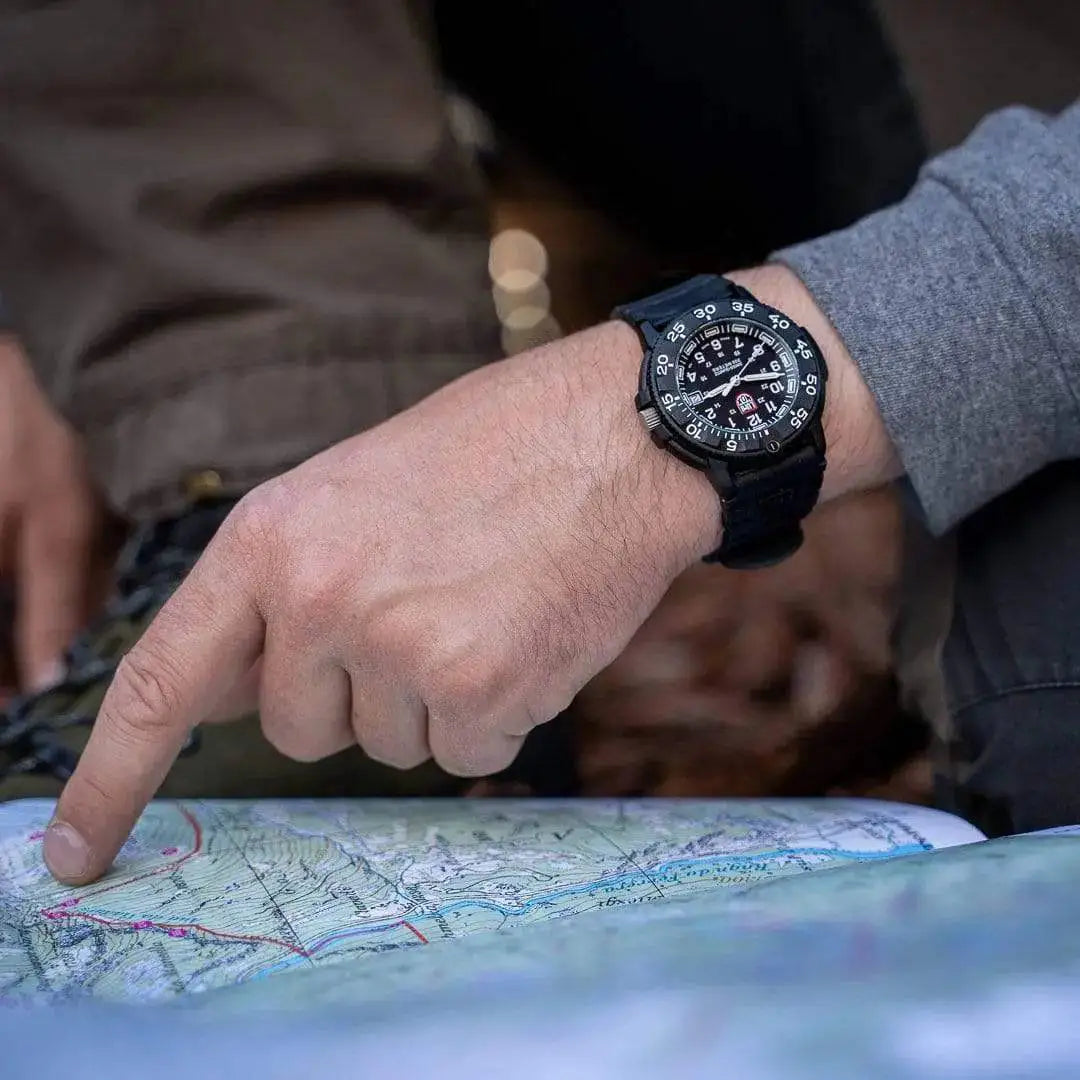 Luminox Navy Seal 3000 Series Diver Watch XS.3001.F worn on a wrist during outdoor navigation, demonstrating its rugged and tactical design.  from  John Bull Clothing 