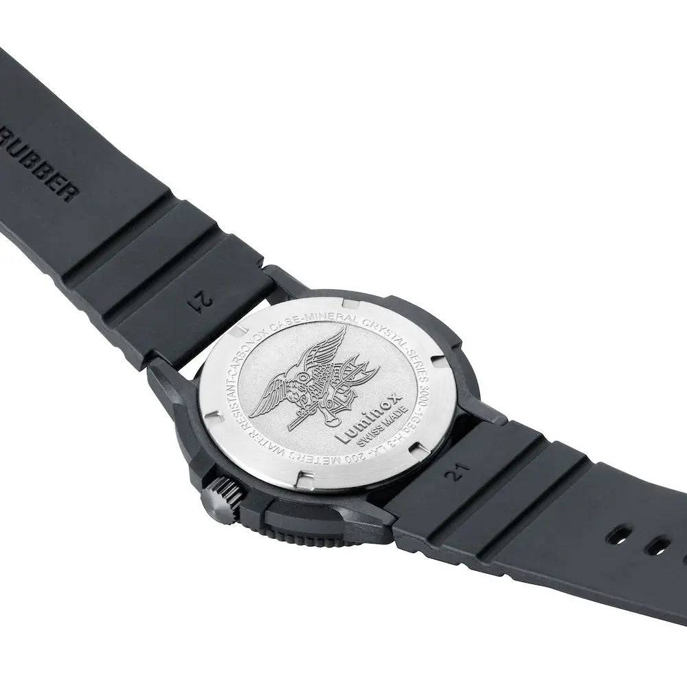 Back view of the Luminox Original Navy Seal 3000 Series Watch, displaying the engraved Navy SEAL emblem on the stainless steel case back.
