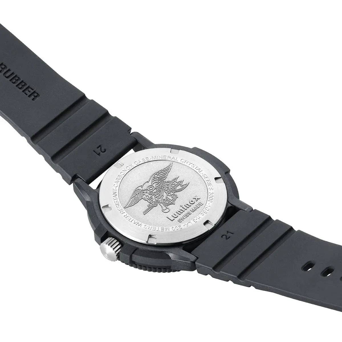 Back view of the Luminox Navy Seal 3000 Series Watch XS.3001.EVO.OR.S, featuring an engraved stainless steel case back with the Navy SEAL emblem.