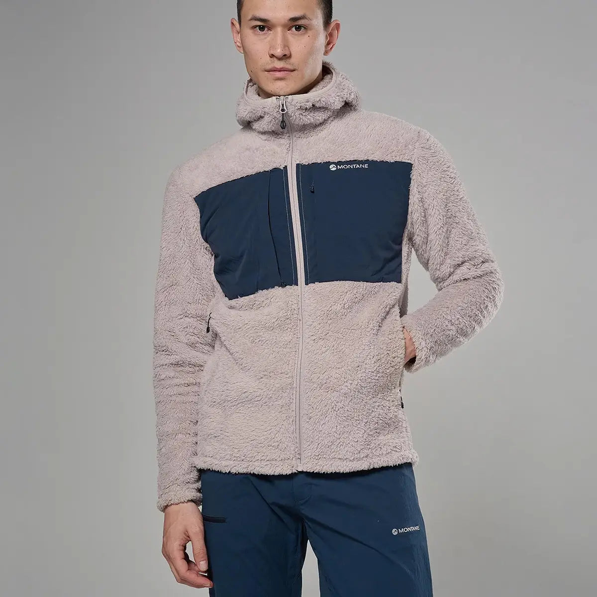 Montane men's Caldus XT 2.0 hooded fleece jacket in beige with navy chest panels, made of high-pile fleece, front zipper, outdoor apparel