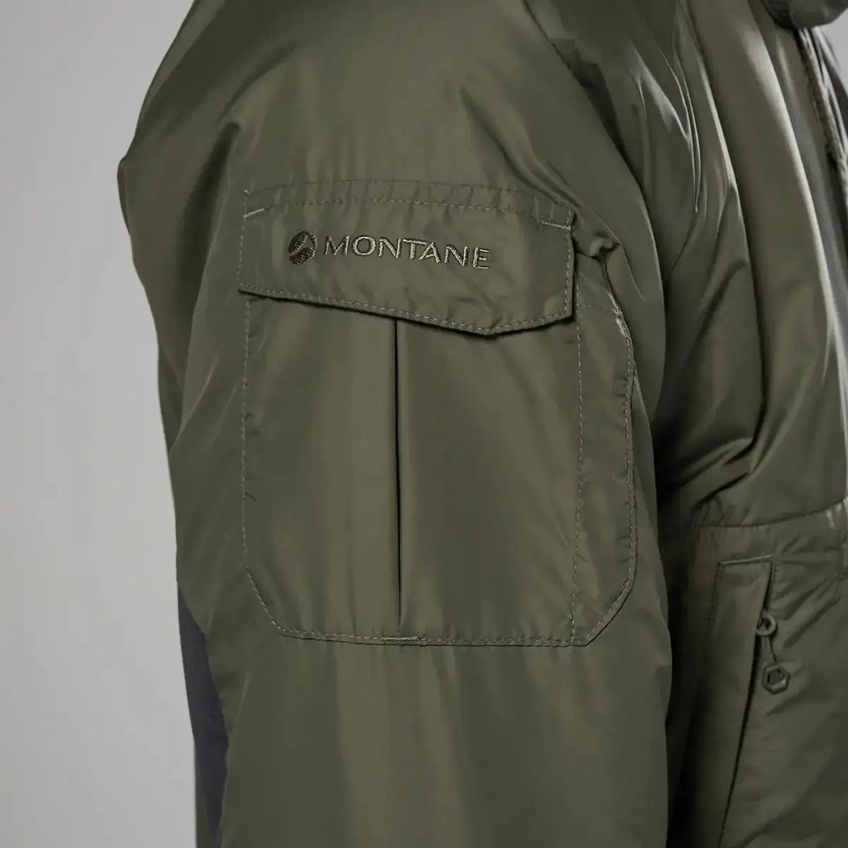 Close-up of Montane logo on sleeve pocket of Extreme Smock Insulated Mens jacket in olive, emphasizing utility and branding, John Bull Clothing.  from  John Bull Clothing 