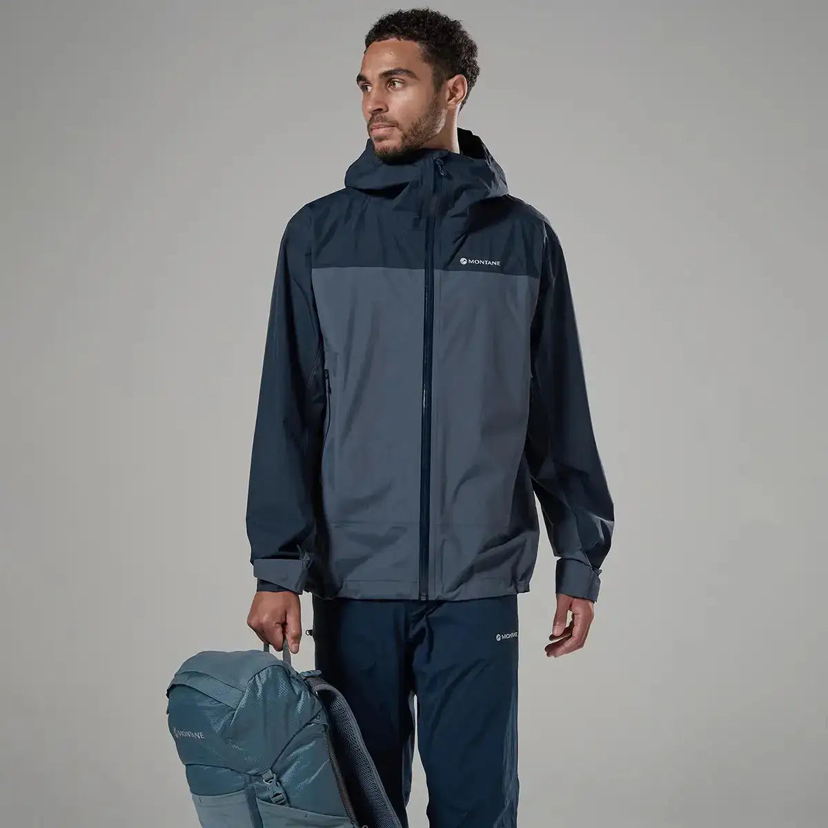 Montane men's waterproof jacket with hood, front view  from  John Bull Clothing 
