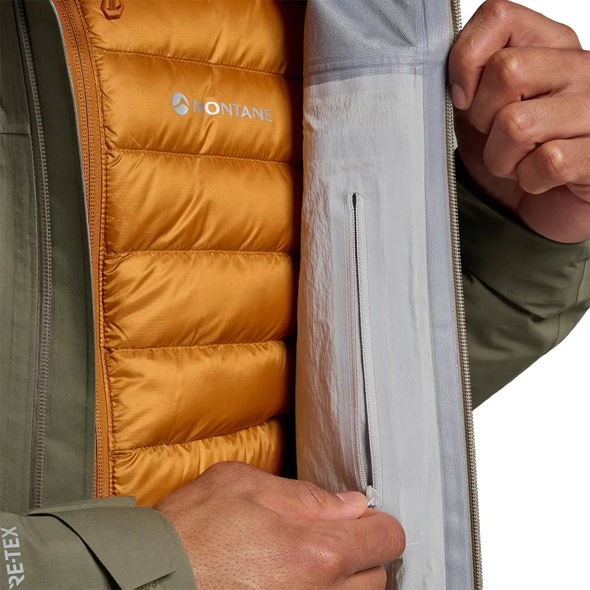 Detail of inner zip pocket on Montane Mens Phase Goretex Waterproof Jacket, emphasizing secure storage and Gore-Tex seam sealing.