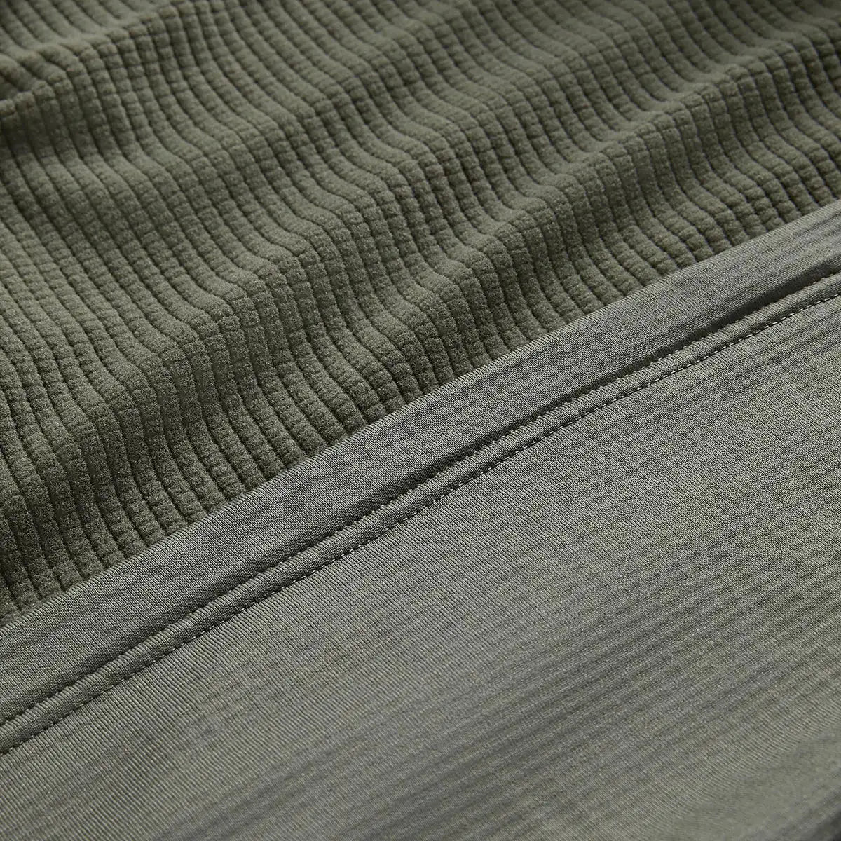 Close-up of fleece fabric texture of Montane Mens Protium Hoodie Fleece Jacket  from  John Bull Clothing 