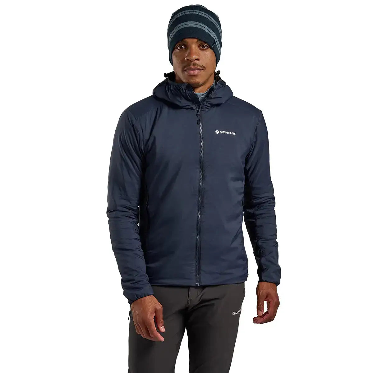 Model wearing Montane Mens Sirocco Hooded Insulated Jacket in navy, styled for active outdoor and urban environments.  from  John Bull Clothing 