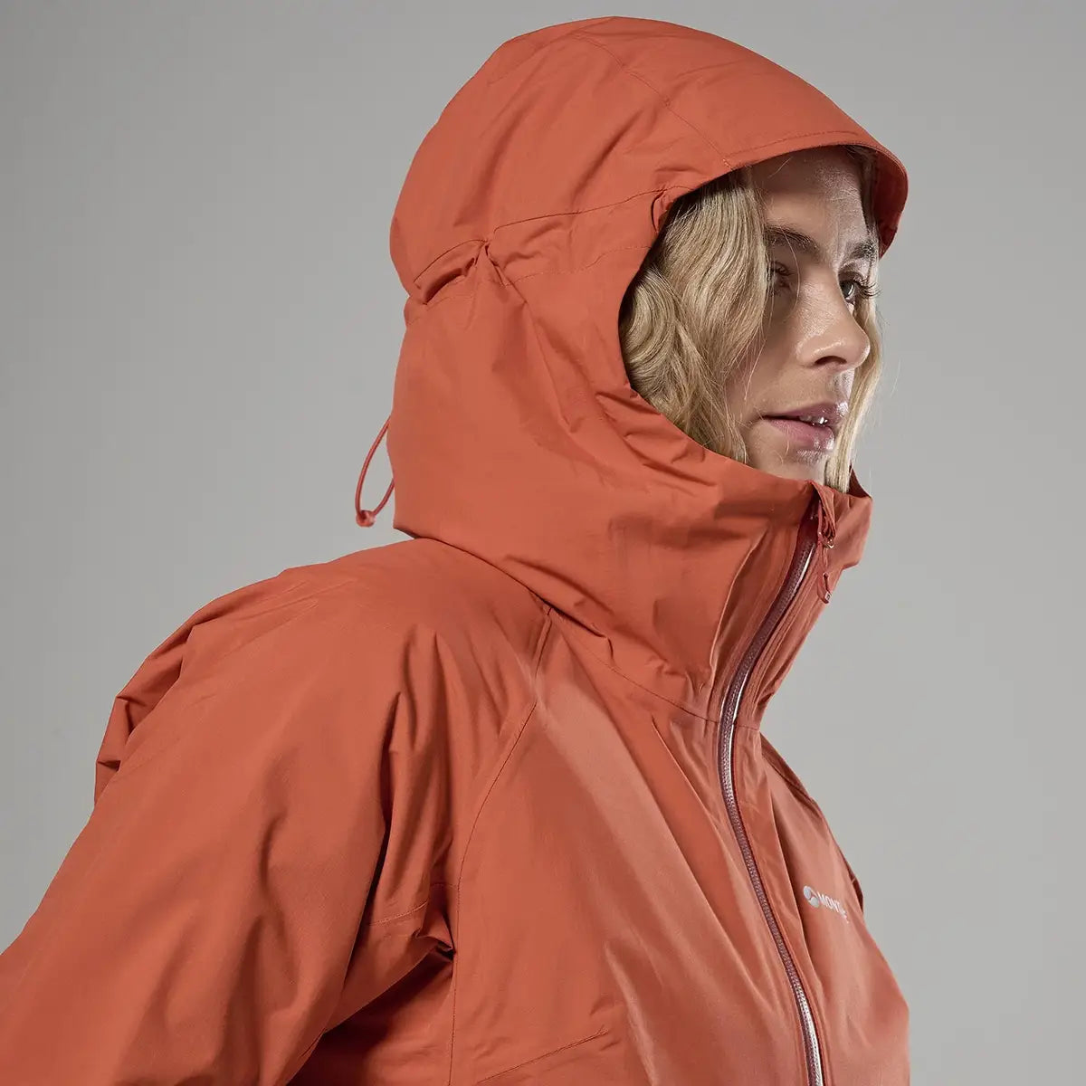 Montane hooded waterproof jacket with high collar and adjustable drawstring
