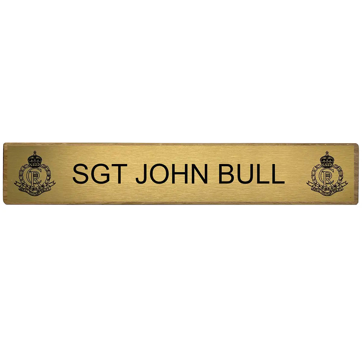 Close-up of Regimental Desk Name Plate on Wooden Block (Toblerone) with engraved brass plate featuring military rank and insignia.