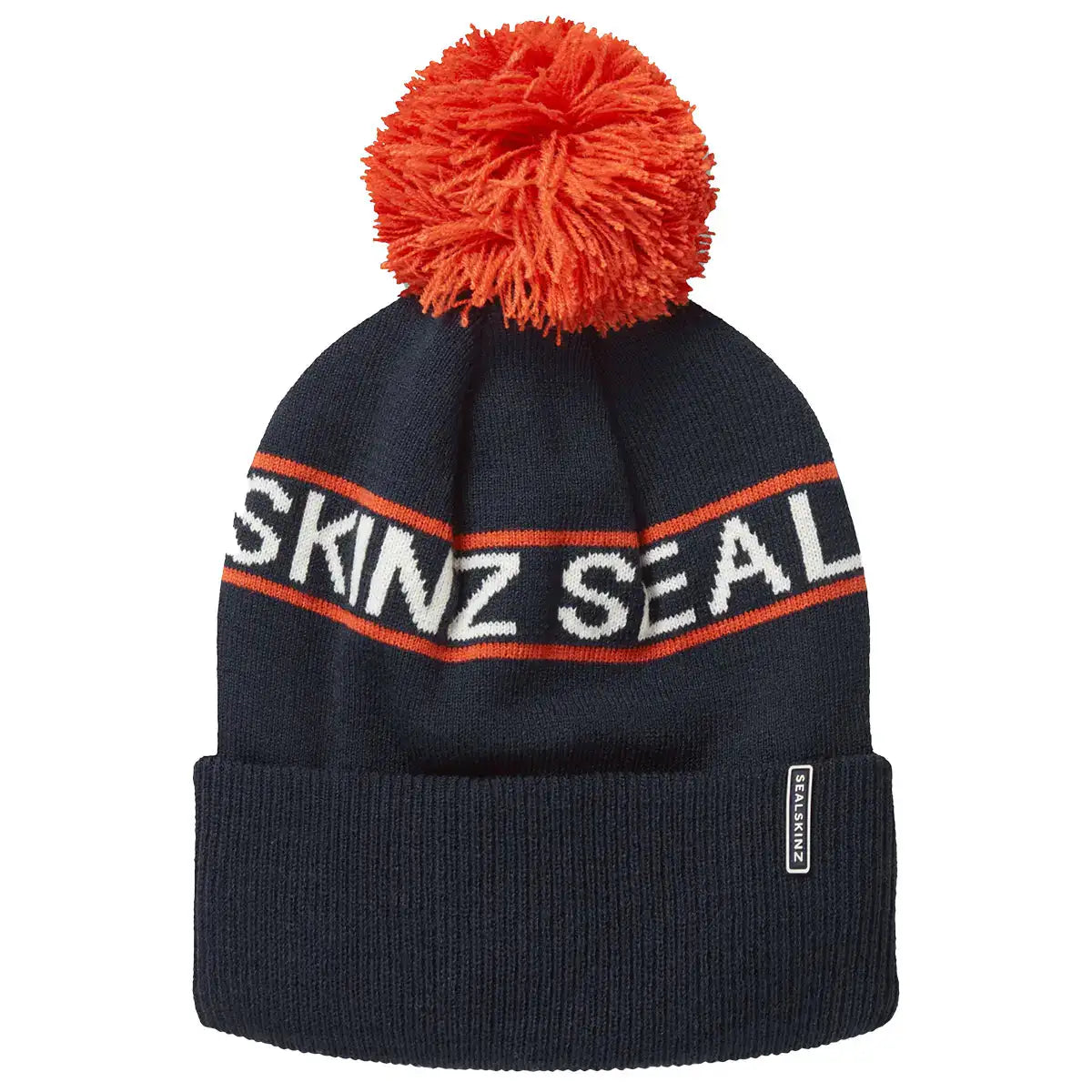 Navy Sealskinz Heacham Waterproof Cold Weather Icon Bobble Hat with orange pom-pom and stripe, stylish and functional cold weather gear. Navy 2025 from  John Bull Clothing 