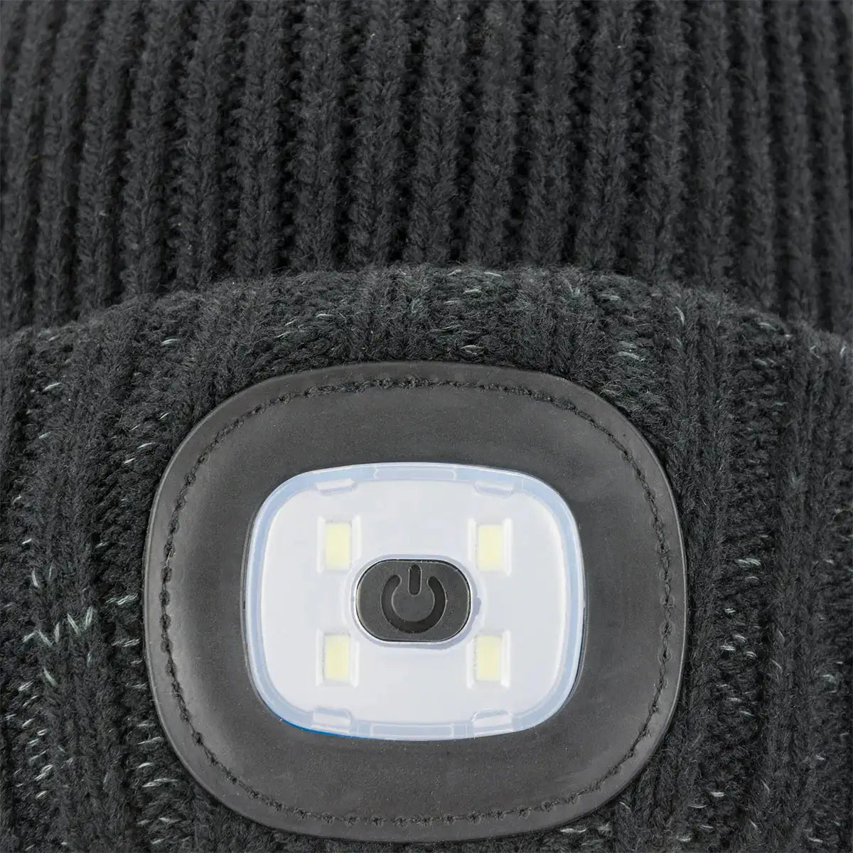 Close-up of black ribbed knit fabric on Sealskinz Heydon WP cold weather LED beanie, showing detailed texture and waterproof construction