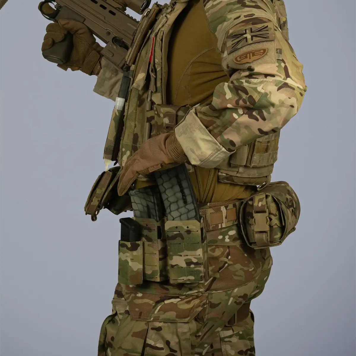 Camo magazine pouches with ammunition magazines for military use