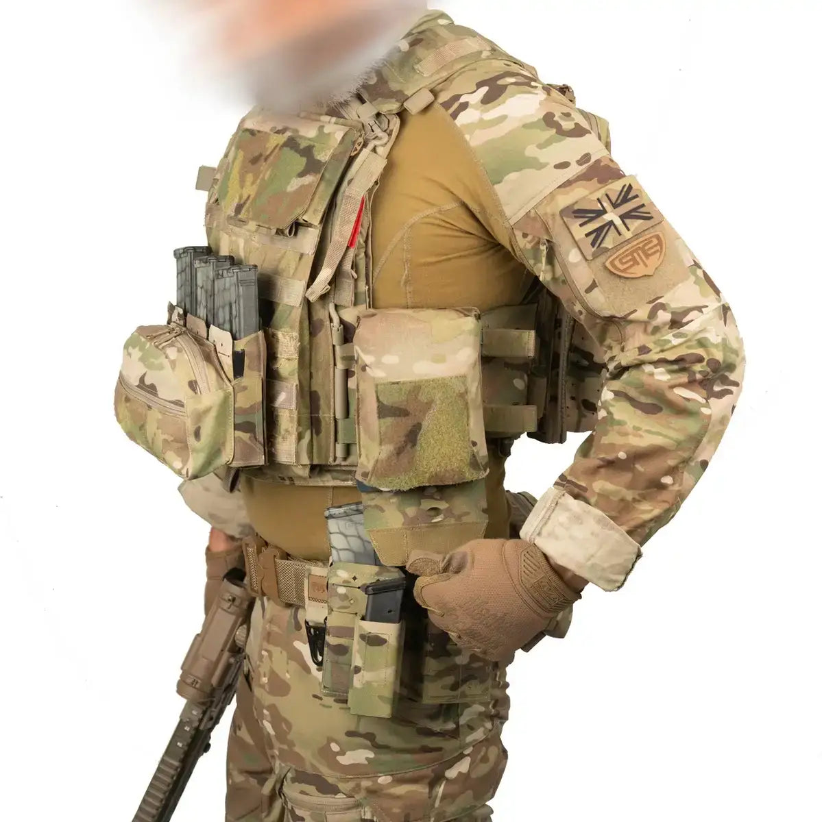 Camouflage tactical vest with multiple pouches and gear attachments, worn by a soldier in combat uniform, SKU: JB1663