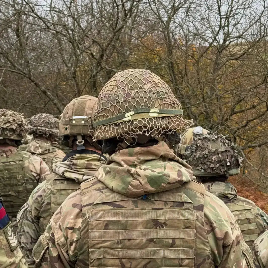 Spectre Scrim Netting on Helmets and Soldiers  from  John Bull Clothing 