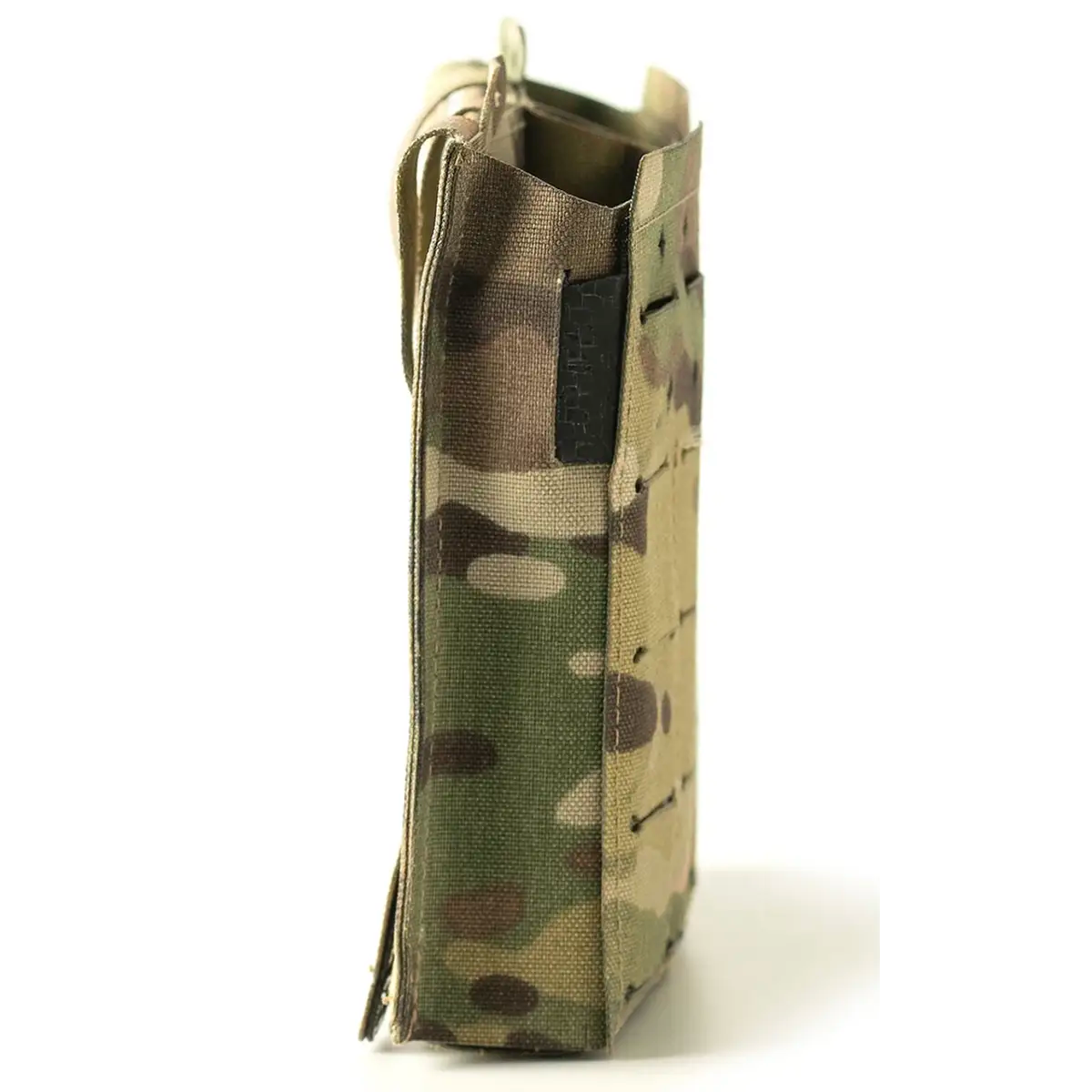 Soldier wearing camouflage gear with magazine pouches and weapon accessories