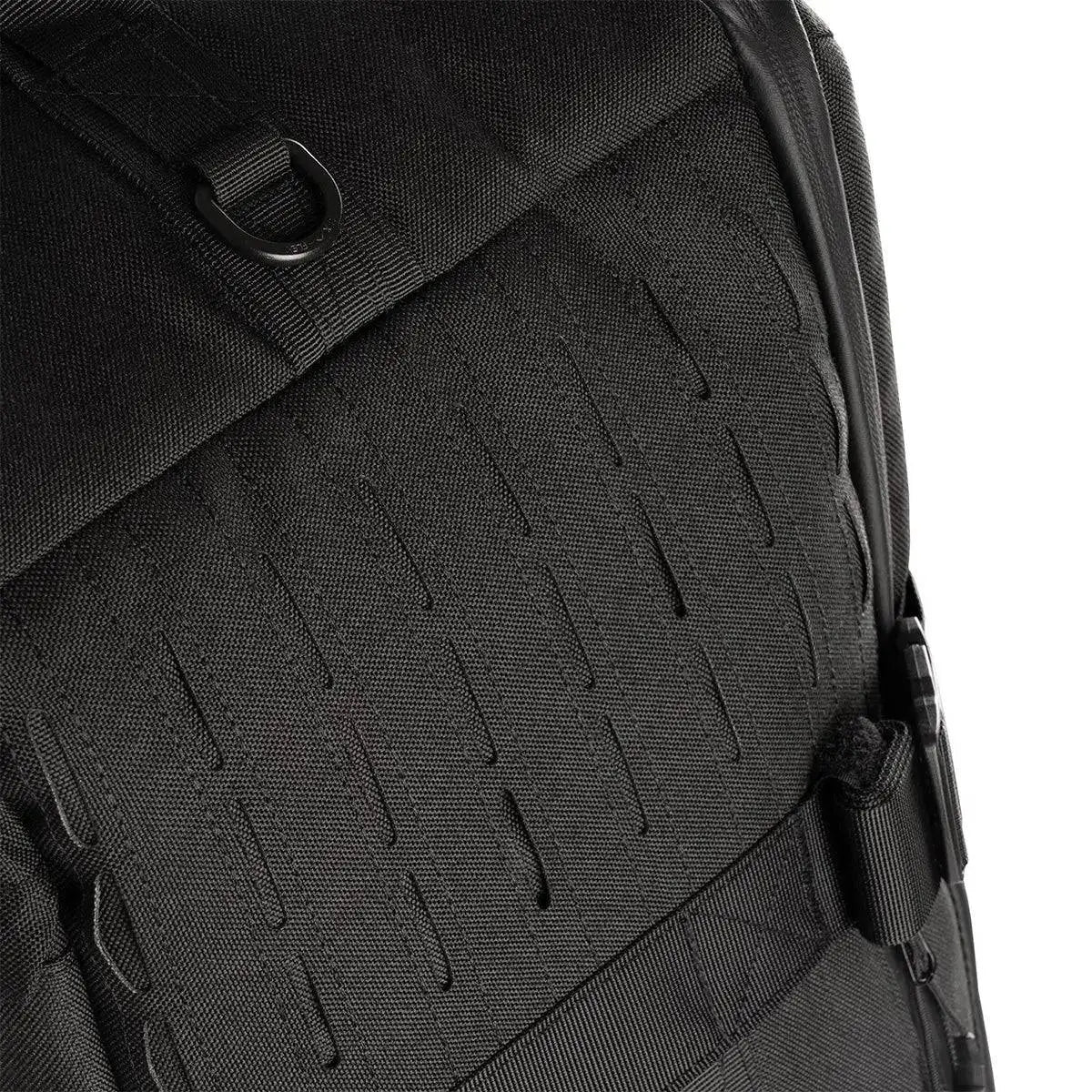 Close-up of Stoirm 50L Black Duffel Bag’s durable fabric with laser-cut MOLLE webbing and reinforced stitching for durability.  from  John Bull Clothing 