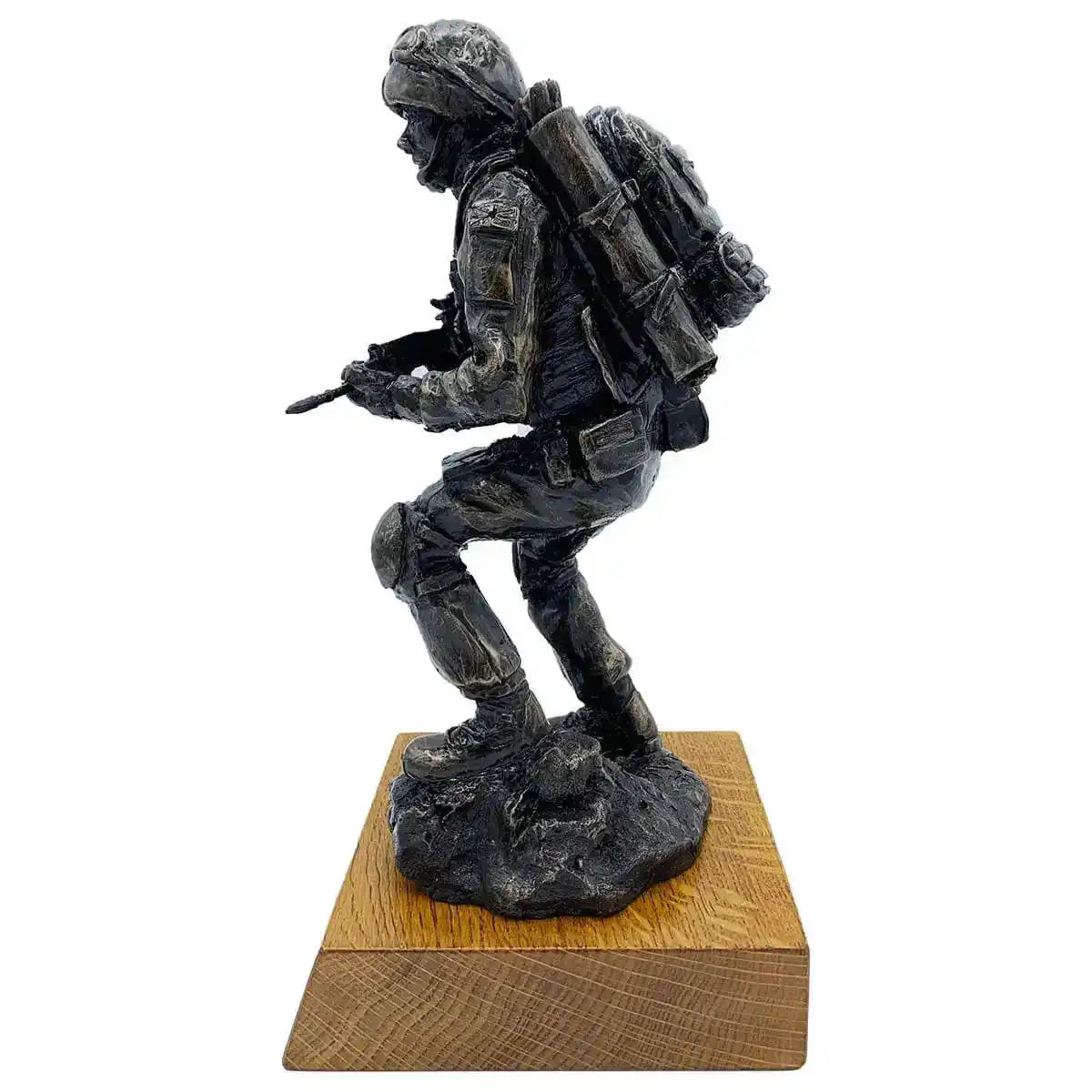 Side view of Afghan Medic Bronze Resin Statue showing detailed gear and uniform, mounted on solid oak base for home or office display.  from  John Bull Clothing 