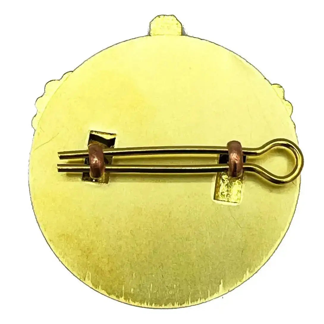 Rear view of the British Army WO2 Brass Crown with backing plate, displaying the secure split pin fitting. Crafted from durable brass for military use.  from  John Bull Clothing 