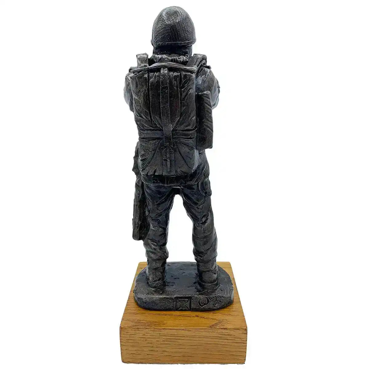 Rear view of Bronze Resin Airborne Drop Order Statue highlighting backpack and uniform details, mounted on a solid oak wooden base.  from  John Bull Clothing 