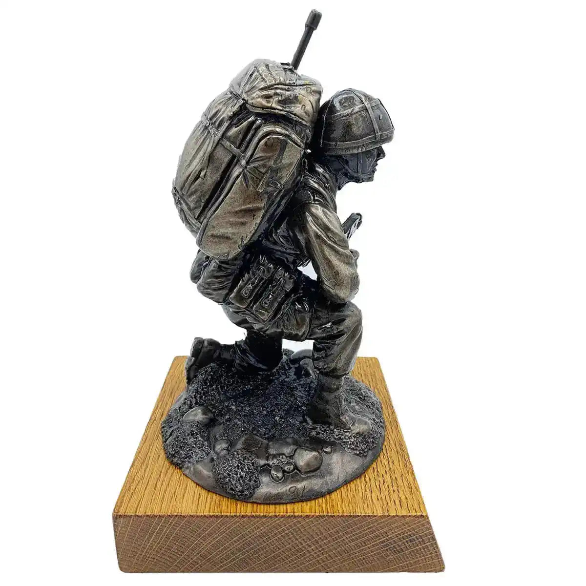 Left side angle of Bronze Resin Kneeling Signaller Statue highlighting uniform and gear details on oak base | John Bull Clothing  from  John Bull Clothing 