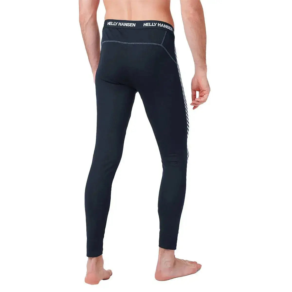 Model wearing black Helly Hansen men's base layer trousers with striped side detail, elastic waistband, performance activewear, SKU: JB0990-S  from  John Bull Clothing 