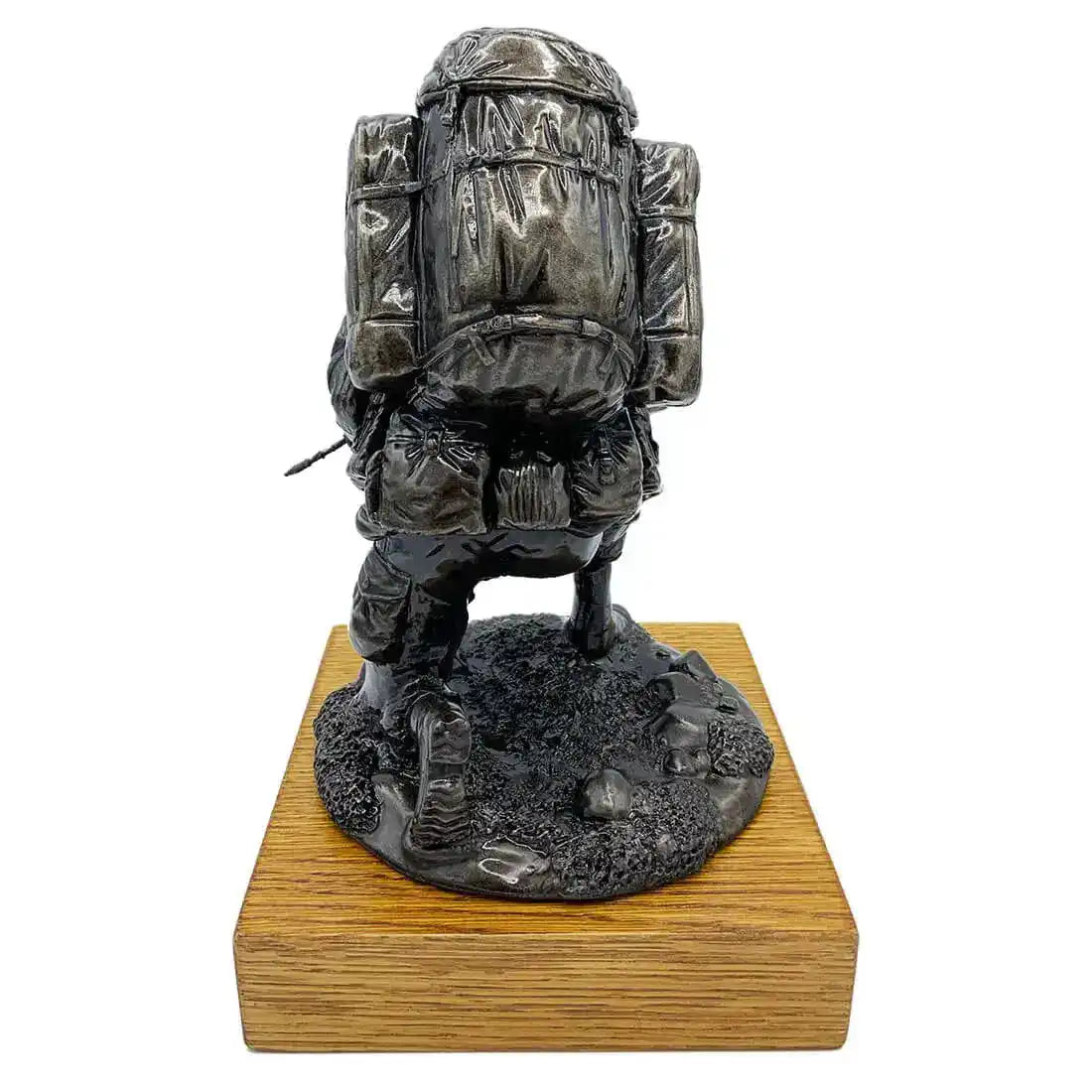 Rear view of Kneeling Combat Figure with Beret Bronze Statue showing intricate backpack and uniform details, perfect for army sculpture collectors.  from  John Bull Clothing 