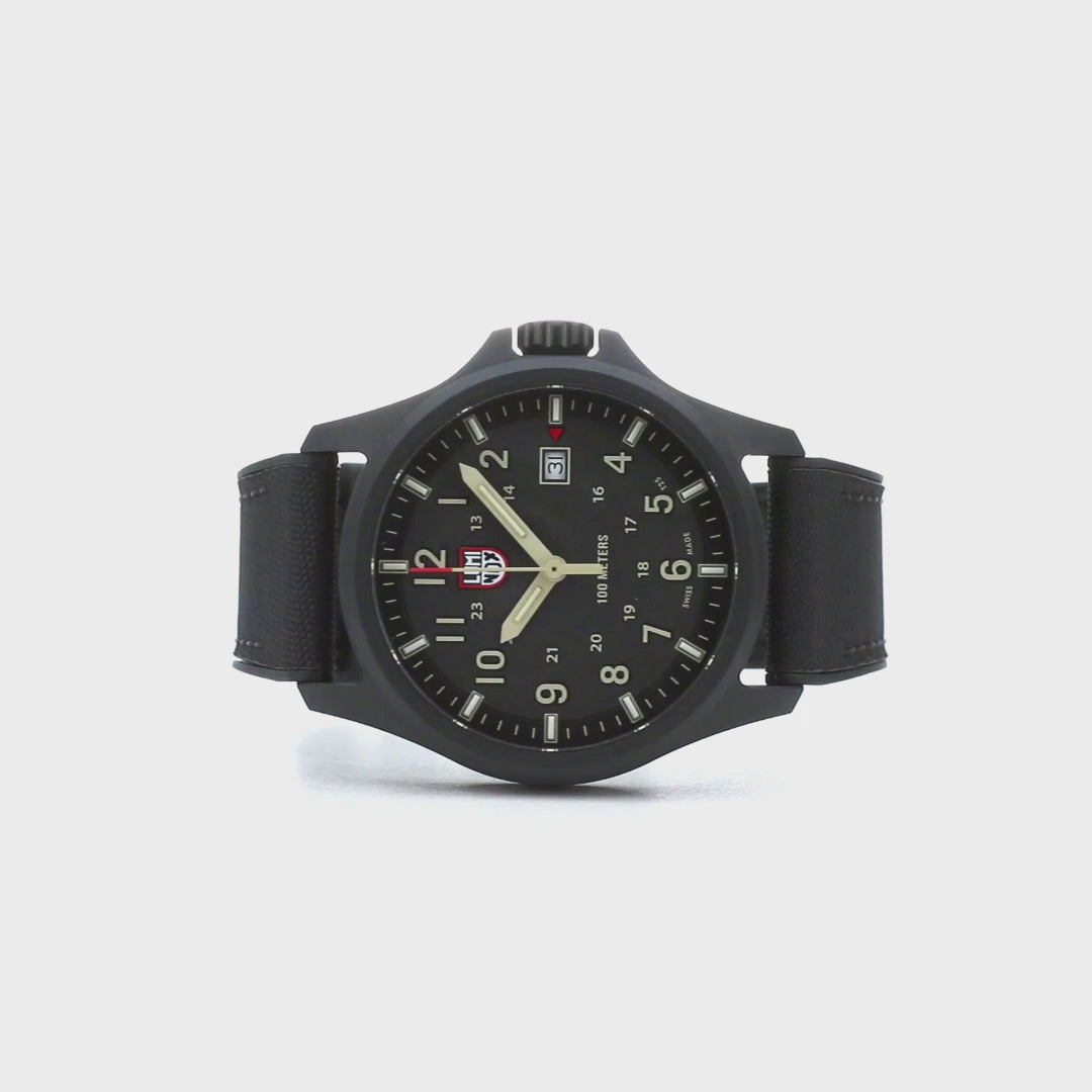 Front-facing view of the Luminox Atacama Field 1960 Series Watch XL.1970.SET with a black dial and beige numerals, offering a clear and bold time display.