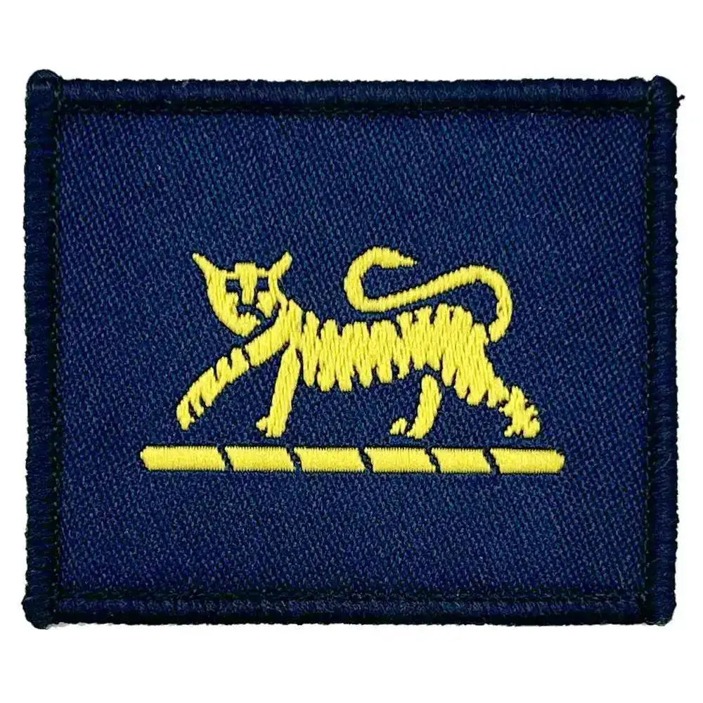 Close-up of a single Princess of Wales Royal Regiment (PWRR) 'Tiger' TRF patch featuring an embroidered yellow tiger on a navy blue background. 1 Flash from  John Bull Clothing 