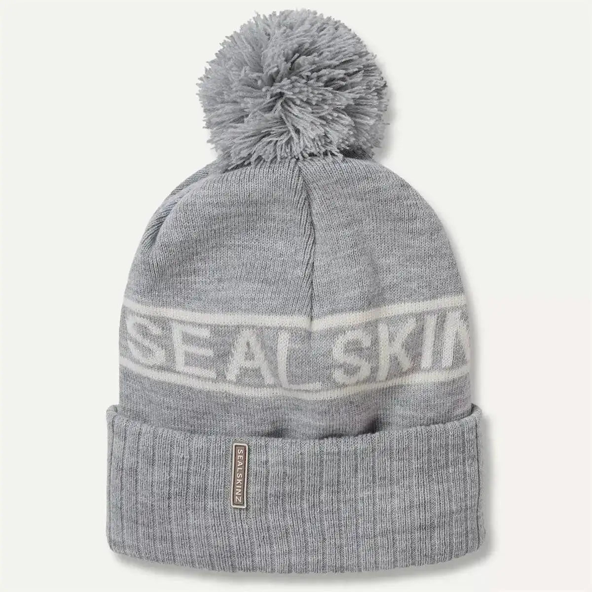 Light grey Sealskinz Heacham Waterproof Cold Weather Icon Bobble Hat with subtle white logo and pom-pom, cozy and waterproof. Light Grey/Cream from  John Bull Clothing 