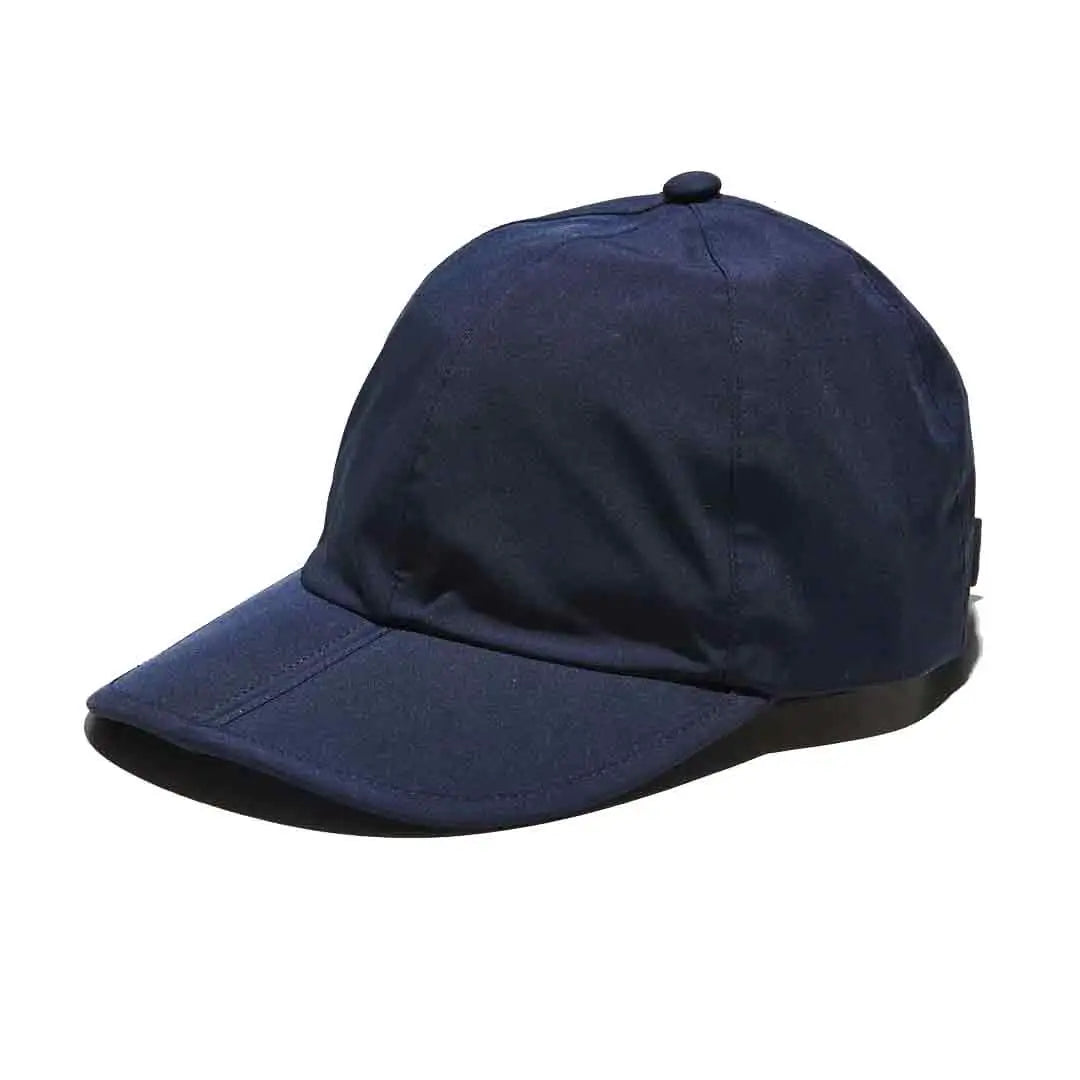 Navy Sealskinz Salle Waterproof Foldable Peak Cap with curved brim and structured crown, ideal for outdoor wear in all weather conditions. Navy Blue from  John Bull Clothing 