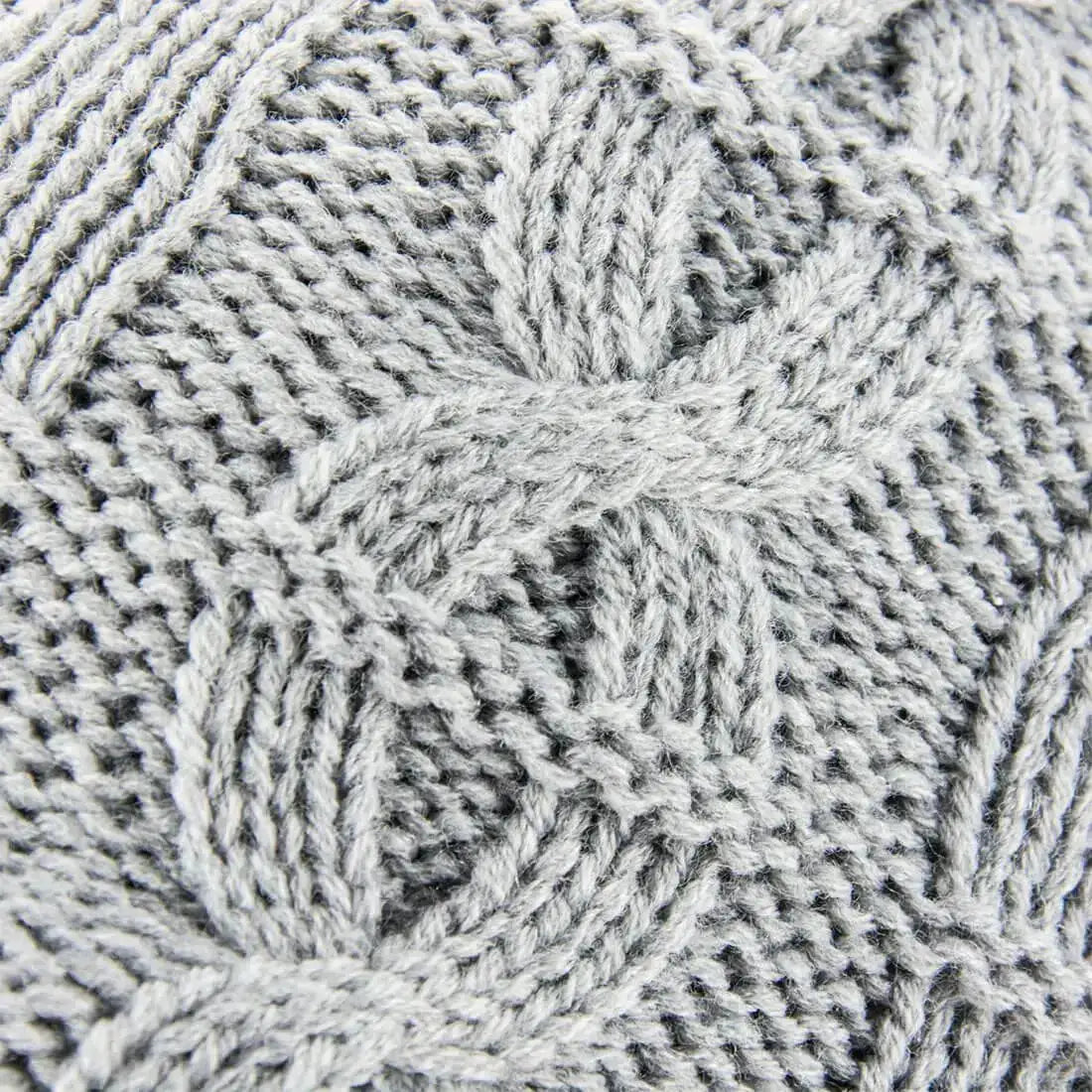 Close-up of the light gray Sealskinz Waterproof Cold Weather Cable Knit Beanie showcasing intricate cable knit detailing for a stylish and cozy look.  from  John Bull Clothing 