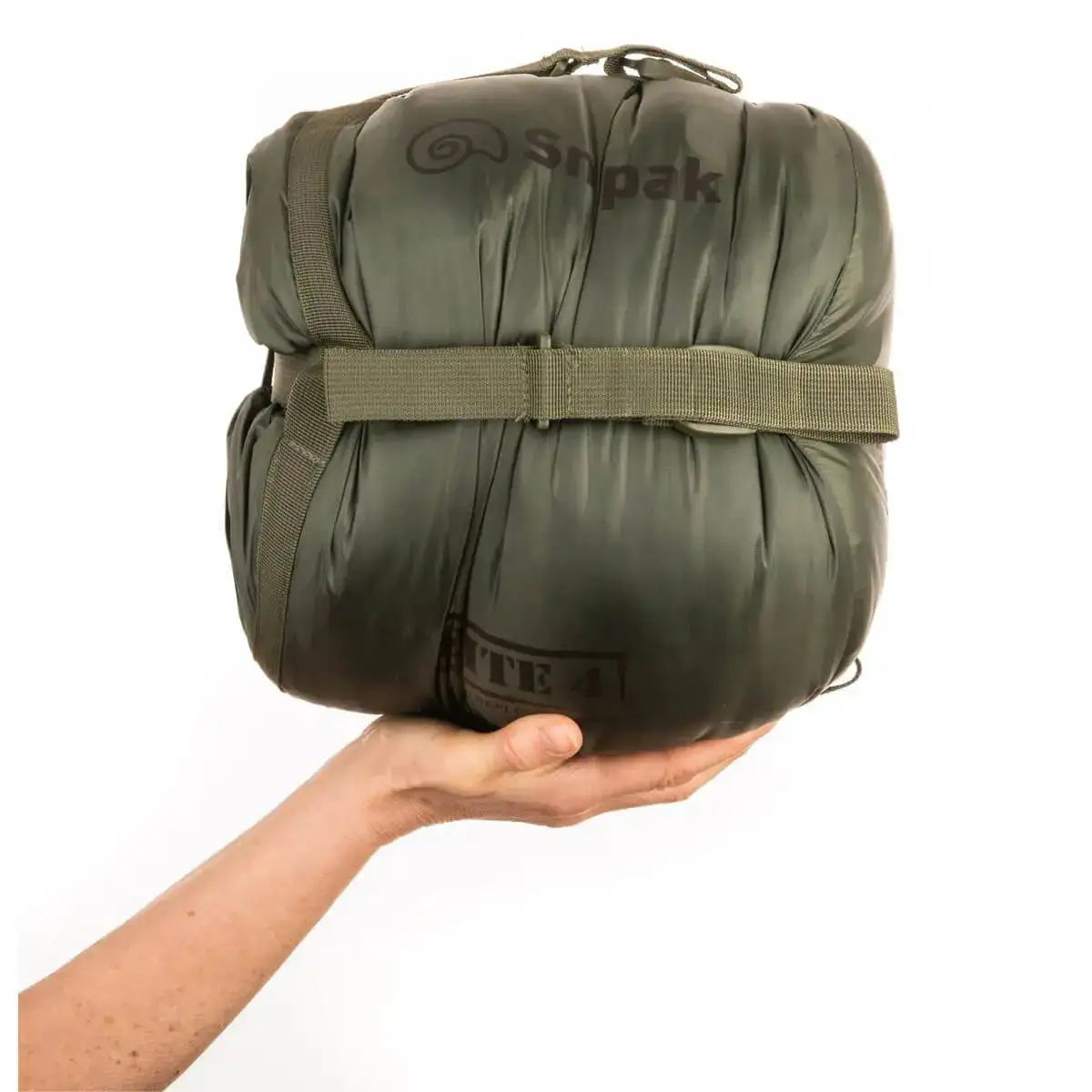 Snugpak Elite 4 Sleeping Bag Olive Green packed compactly in compression sack, showcasing lightweight portability for outdoor enthusiasts.  from  John Bull Clothing 