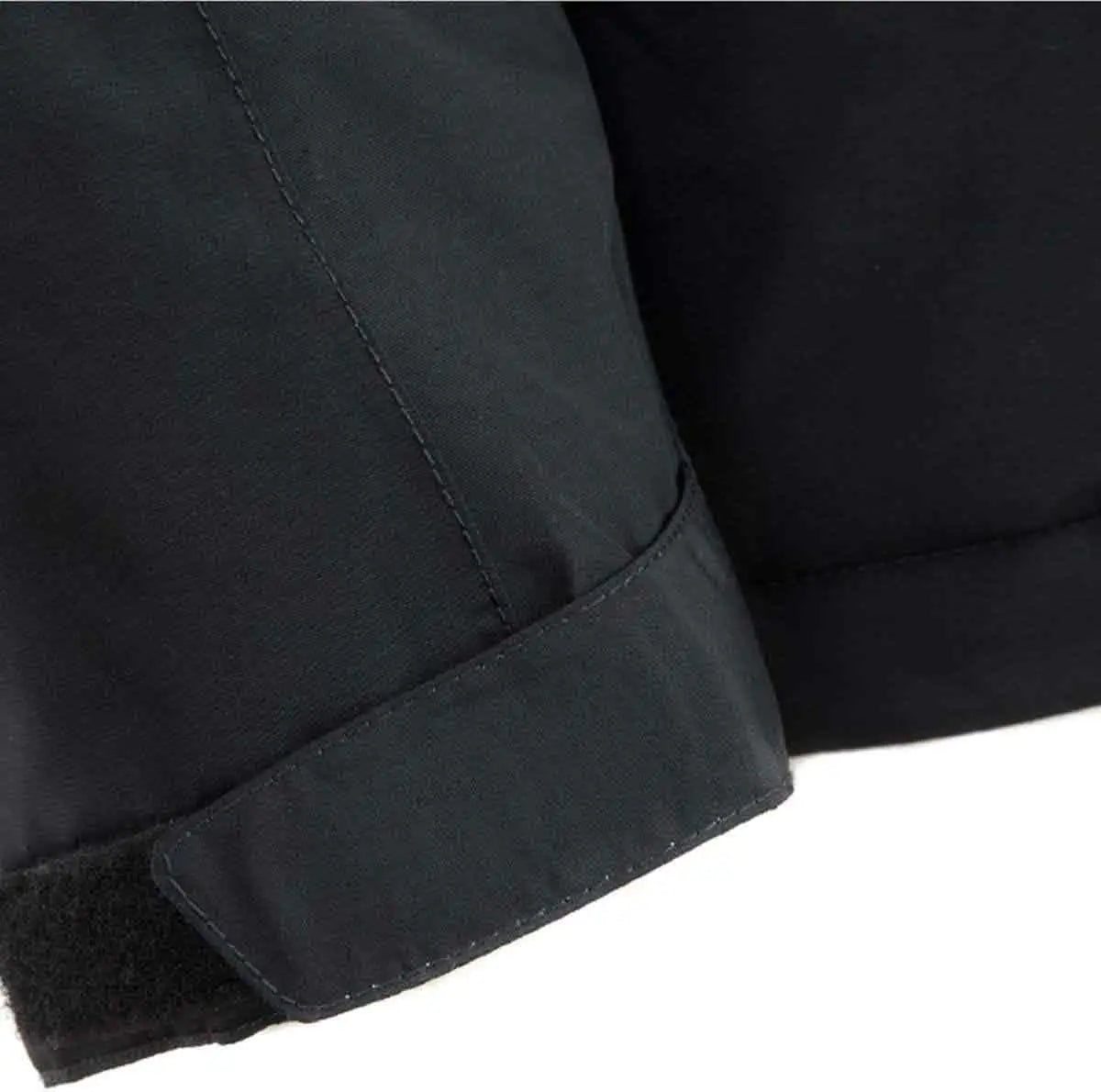 Detail of Snugpak Torrent Jacket cuff with Velcro strap for adjustable wrist fit and enhanced weather sealing.  from  John Bull Clothing 