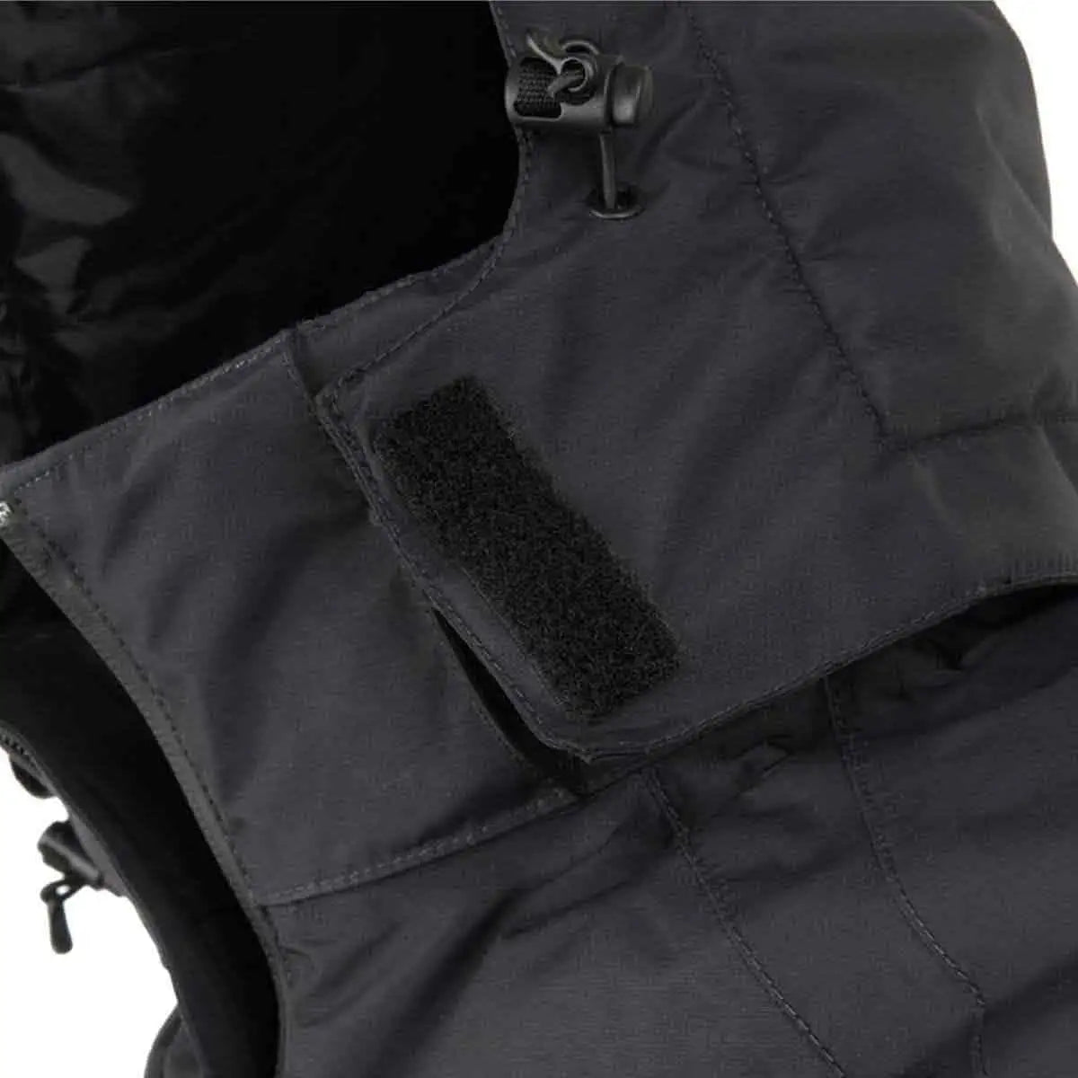 Close-up of Snugpak Torrent Jacket hood with adjustable drawcord and Velcro flap for added wind protection and fit customization.  from  John Bull Clothing 