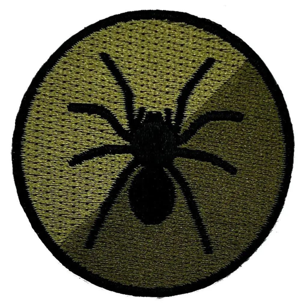 Single military tactical recognition flash patch with a black spider emblem on an olive green circular background, designed with hook & loop backing.