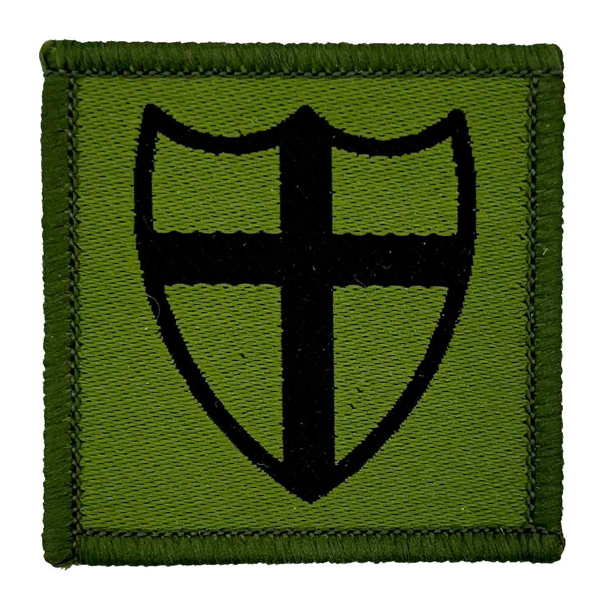 Single 8th Force Engineer Brigade TRF Sew On Patch featuring a black cross on a green shield, made from durable cotton for military use.