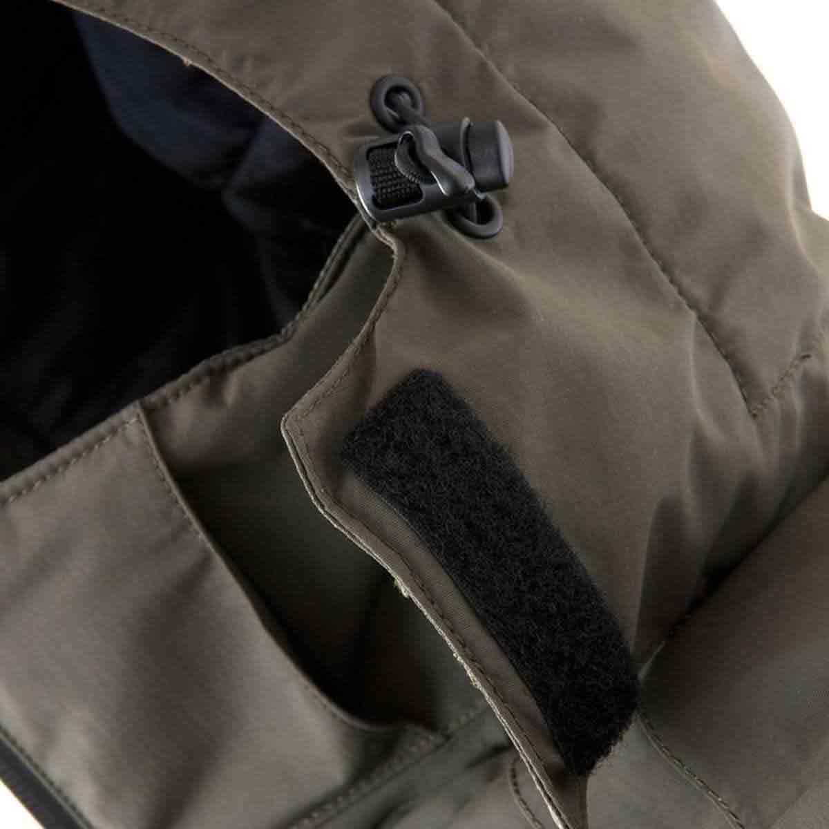 Close-up of Snugpak Torrent hood adjustment toggle and Velcro flap, showcasing waterproof design and secure fit.